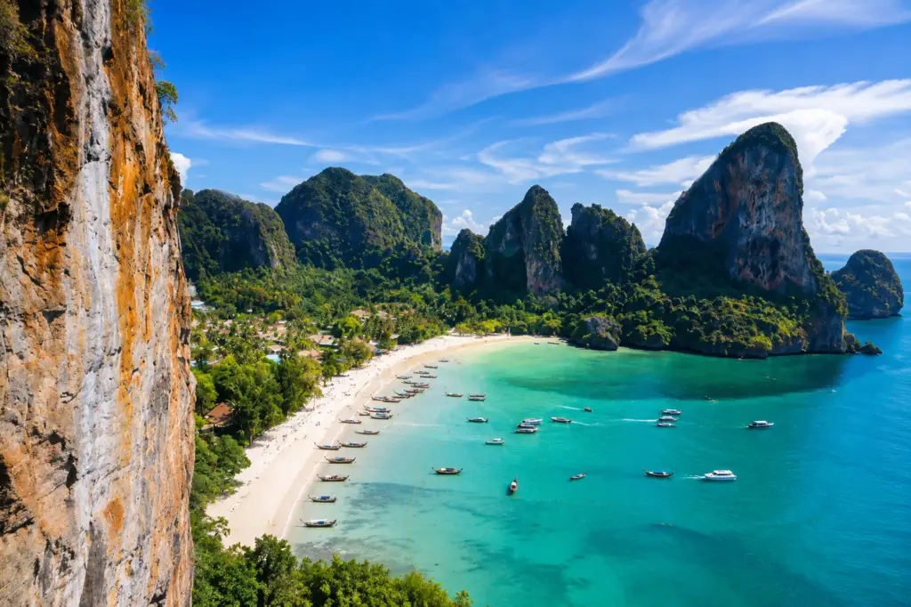 Scenic view of a tropical beach, turquoise sea and limestone cliffs in Phuket, Thailand