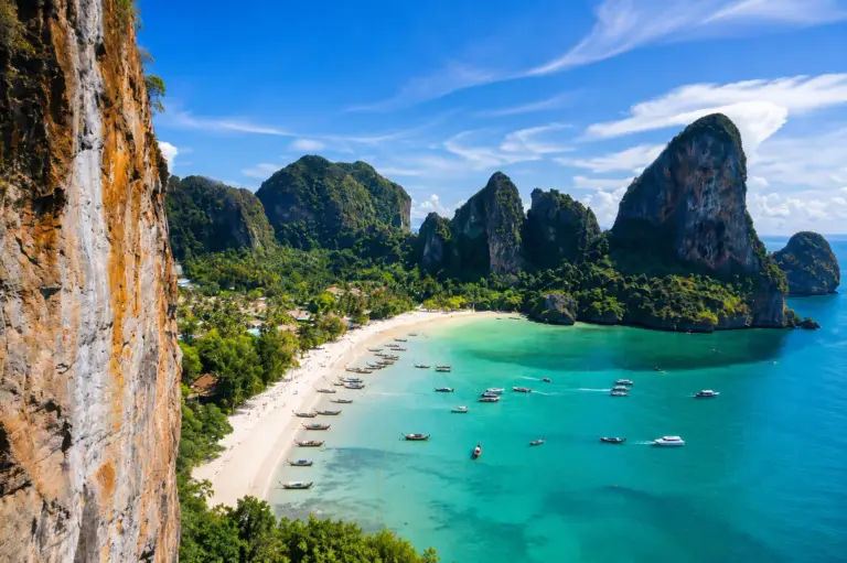 Scenic view of a tropical beach, turquoise sea and limestone cliffs in Phuket, Thailand