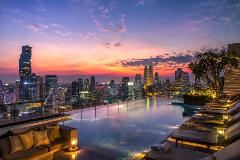 Bangkok hotel swimming pool overlooking the city skyline